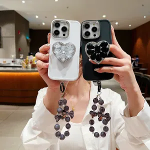 Stone Heart Shape Stand Silicone Soft Phone Cover with Bracelet - iPhone 16