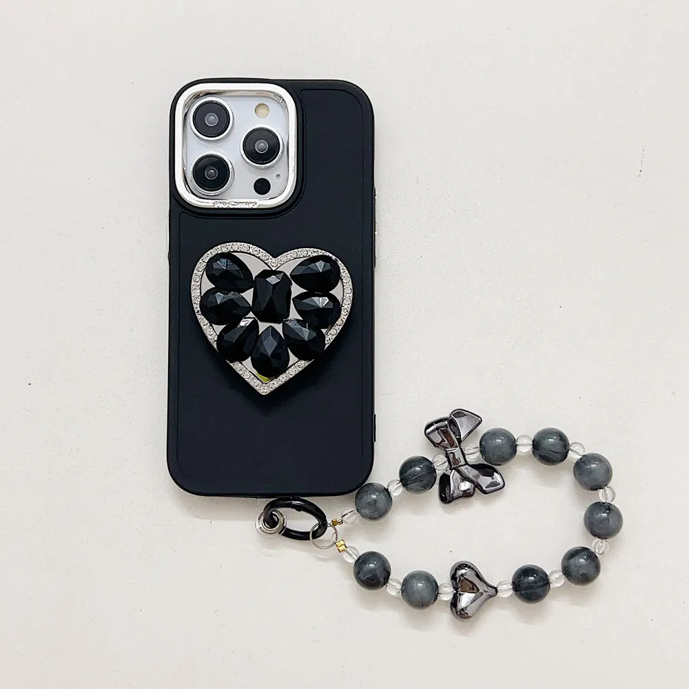 Stone Heart Shape Stand Silicone Soft Phone Cover with Bracelet - iPhone 16