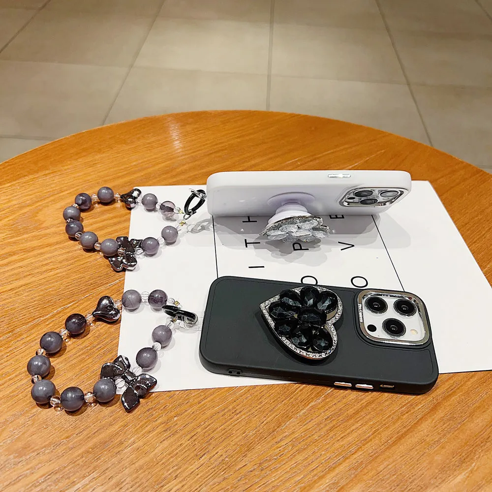 Stone Heart Shape Stand Silicone Soft Phone Cover with Bracelet - iPhone 16