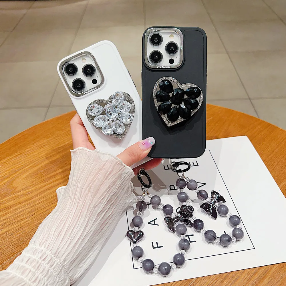 Stone Heart Shape Stand Silicone Soft Phone Cover with Bracelet - iPhone 16