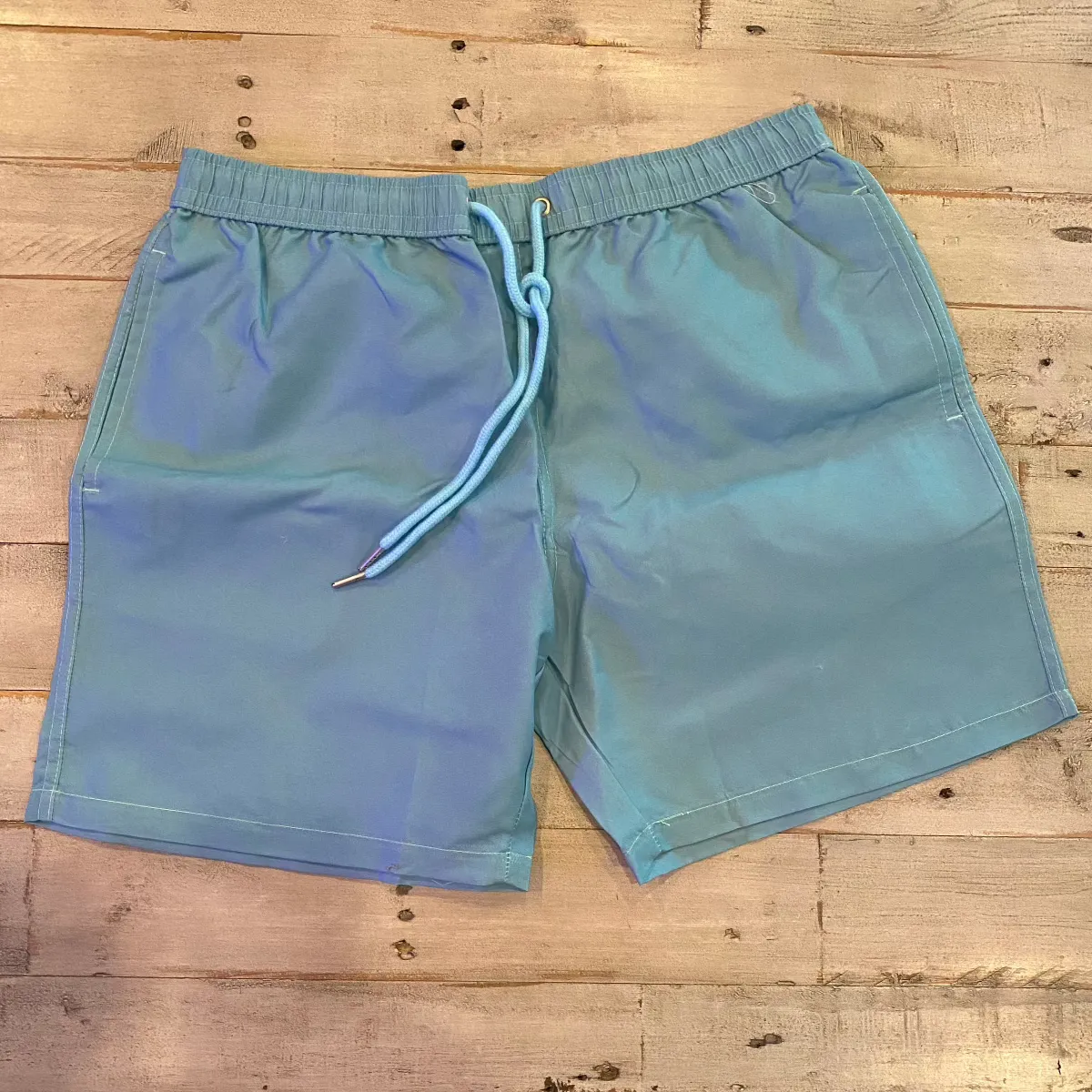 Turquoise Sea Foam Color Changing Kid Trunks